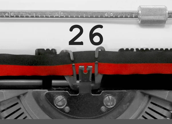 白いシートの古いタイプライターで書かれた の番号のテキスト — ストック写真