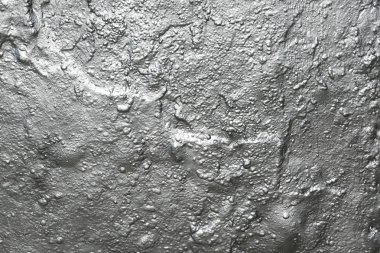 Parıldayan gümüş arka plan bir duvar ile parlak ve gümüş boya