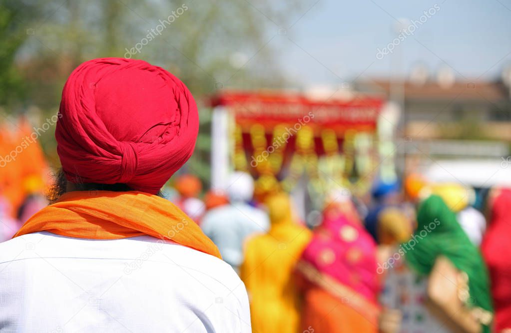 Sikh man with turbant called Dumalla during a religious celebration on the streets of the city