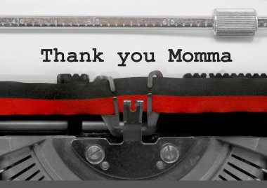 Thank you Momma phrase written by an old typewriter on white sheet clipart
