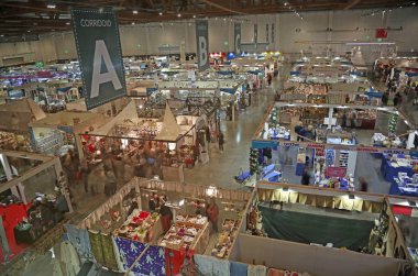 Vicenza, VI, Italy - October 21, 2017: many stands of the great exhibition fair called ABILMENTE with many articles and accessories to work at home and hobbies clipart