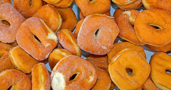 Hintergrund Der Gebratenen Donuts Mit Zucker Gebäck Aufgeführt — Stockfoto
