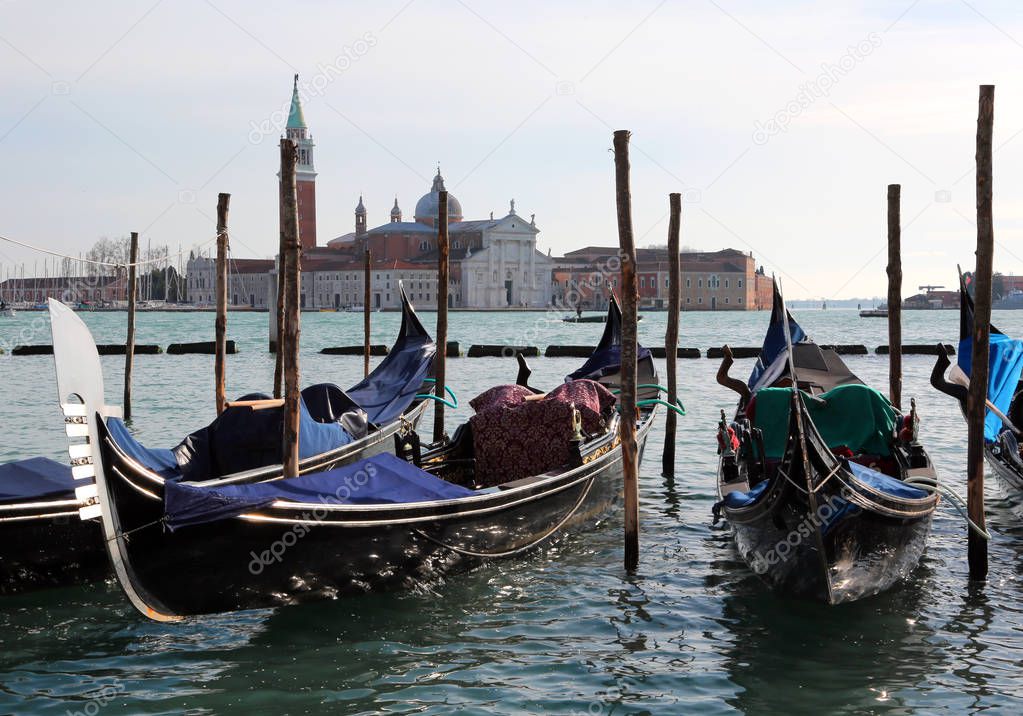 Venice in Italy Some Gondolas and the Church of Saint George on Giudecca Canal