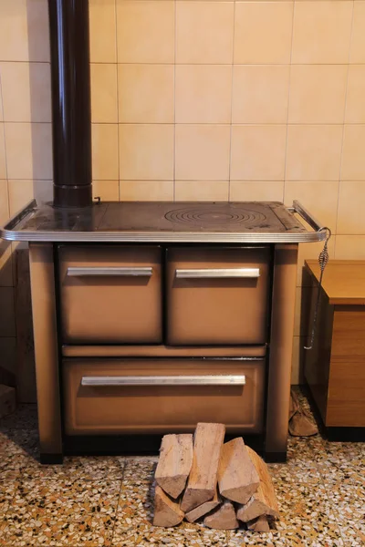 wood-burning stove in the kitchen of the small house