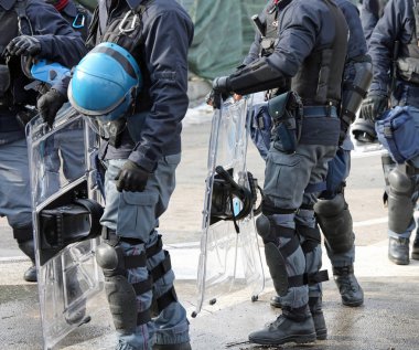 riot deployment of Italian police during a big manifestation clipart