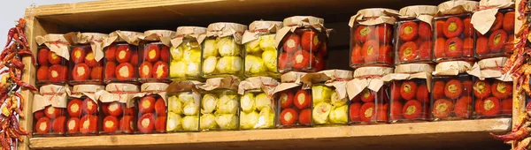 jars with spicy specialties typical of southern Italian regions such as peppers with tuna or artichokes preserved under olive oil