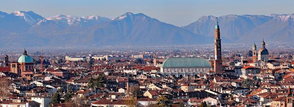 Enchanting panorama of the city of Vicenza in the Veneto region in Italy and the medieval monument called Basilica Palladiana with the tall Clock Tower