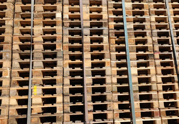 Hintergrund Vieler Holzpaletten Für Den Transport Der Güter — Stockfoto