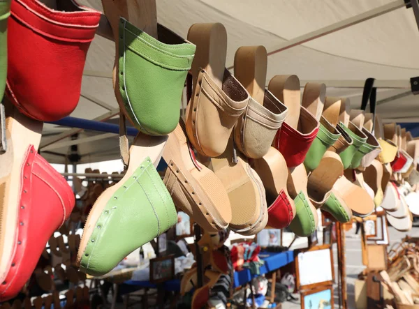 Many Wooden Leather Clogs Hanging Sale Stall Handmade Shoes — Stock Photo, Image