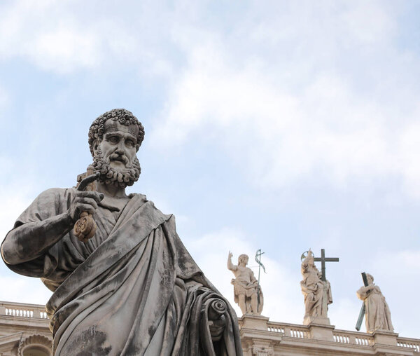 Statue of Saint Peter with the keys in Vatican City and the stat