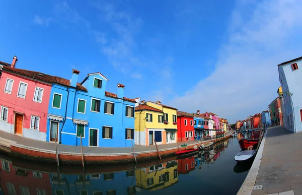 waterway on Burano Island and the famous Colourfully painted hou