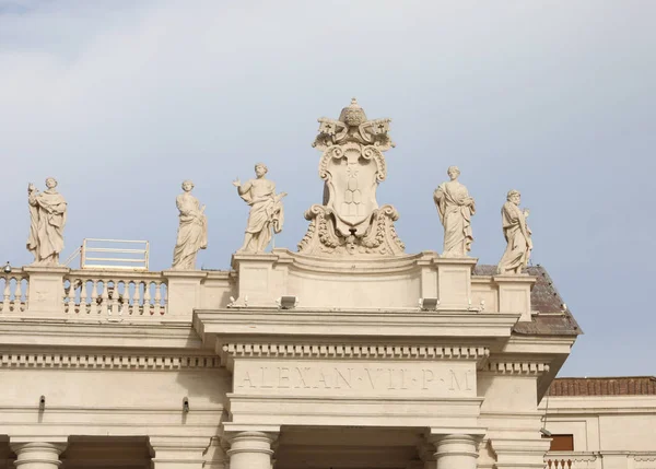 white statues on the Saint Peter Square in Vatican City