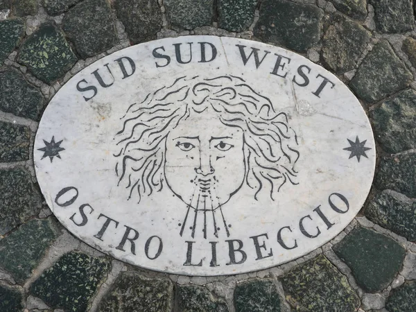 Symbol of the wind called Ostro Libeccio in Italian language wit — Stock Photo, Image
