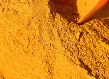 Zerdeçal tozu arka plan macrophotography