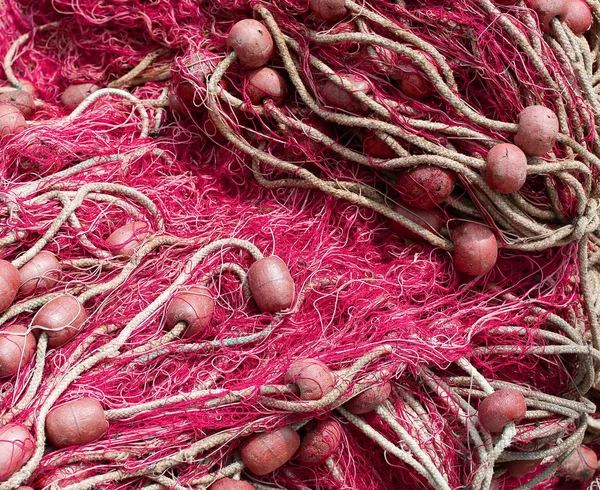 Redes de pesca rojas con flotadores — Foto de Stock