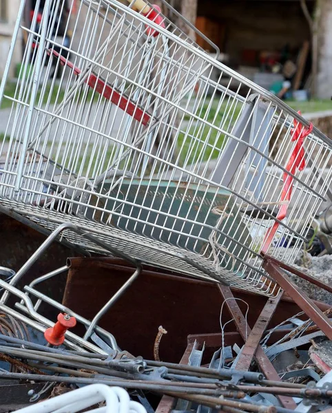 Old shopping cart in recycling ecocenter — Stock Photo, Image