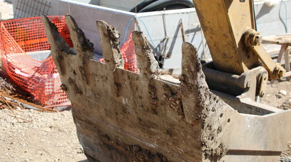 Bucket of a bulldozer in a construction site — Stock Photo, Image