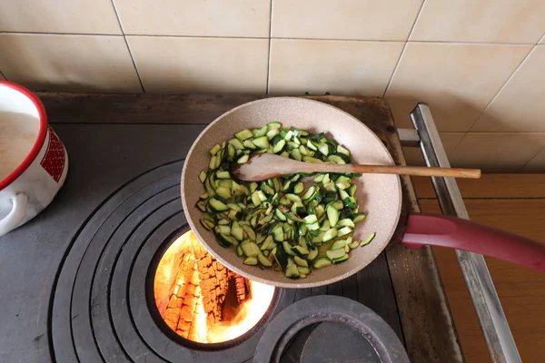 Zucchini cooked in a pan on a wood stove — Stock Photo, Image