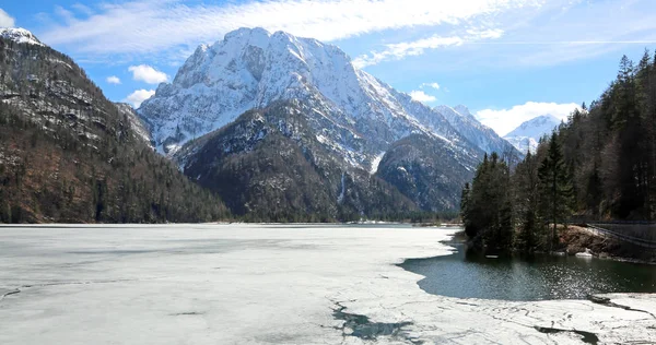 Frozen alpine lake called Lago del Predil in Italian Language — Stock Photo, Image