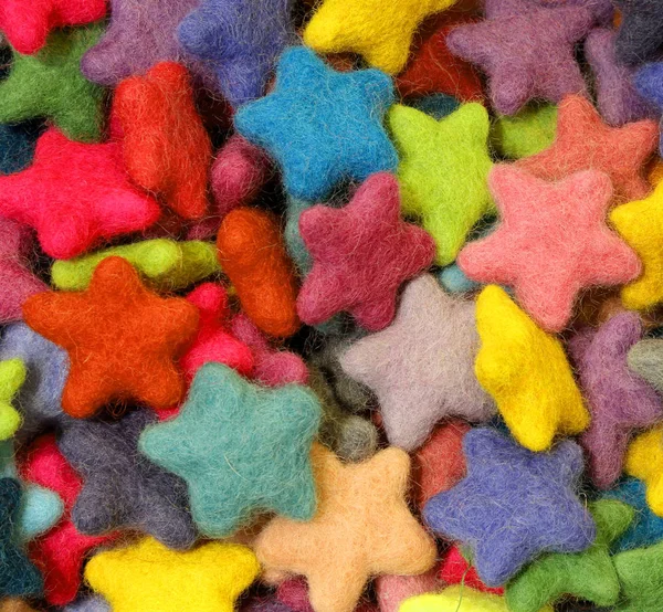Mångfärgade filt små stjärnor — Stockfoto