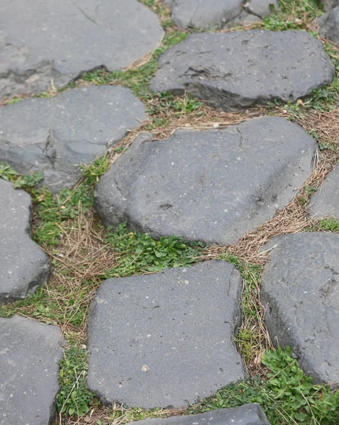 Pedra de uma antiga estrada romana em Roma Itália — Fotografia de Stock