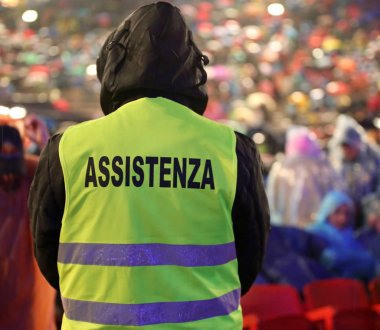 yüksek görünürlük ceket ve metin Assistenza ile çocuk anlamına gelir 