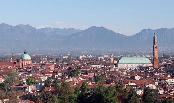 View of Vicenza with Basilica Palladiana in the foreground and the mountains in the background