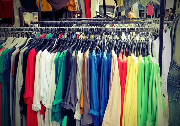 Stand of clothes at flea market — Stock Photo, Image