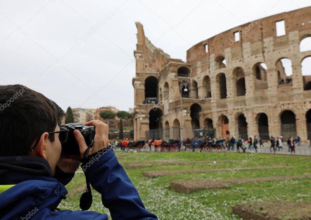 Young photographer with eye glasses in Rome