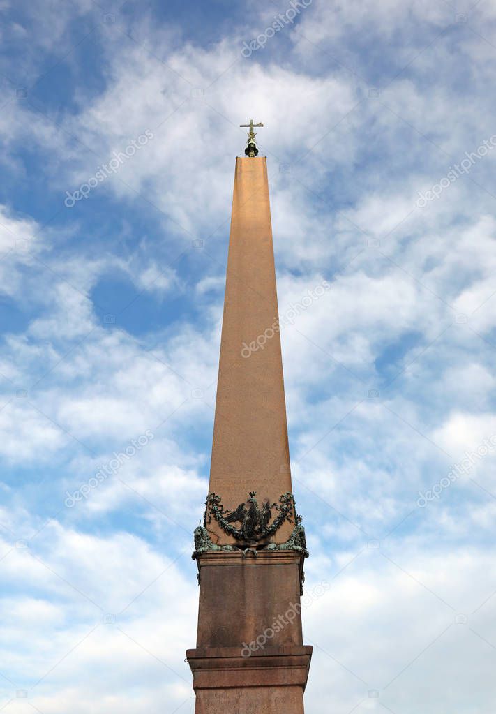 egyptian obelisk with  latin text that means Christ wins Christ 