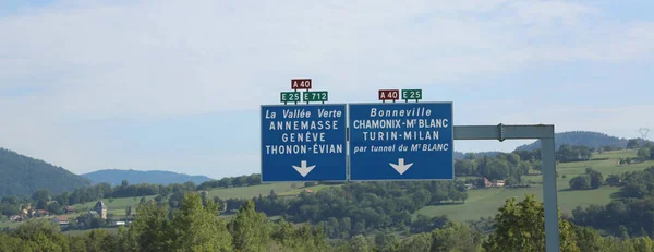 Road sign with white lettering on the French highway — Stock Photo, Image