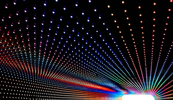Túnel com saída de luz branca e as luzes led coloridas — Fotografia de Stock