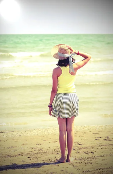 Little girl with straw hat also called boater in summer — Stock Photo, Image