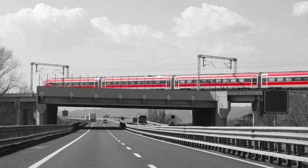 Rome, RM, Italy - March 3, 2019: Red Train over the highway — Stock Photo, Image