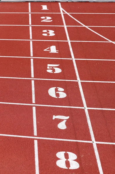 Números da pista de atletismo antes da corrida de velocidade — Fotografia de Stock