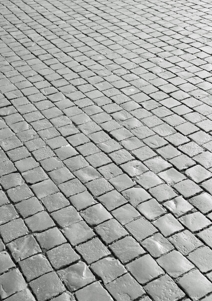 Detail of many cobbles in Saint Peter Square in Vatican City