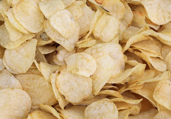 Fundo de muitos chips amarelos — Fotografia de Stock