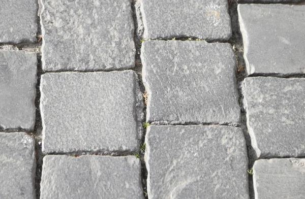 Detalhe de azulejos cinza chamado em italiano Sampietrini — Fotografia de Stock