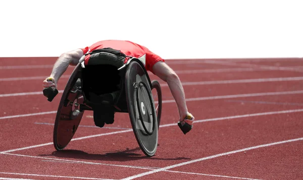 Tekerlekli sandalyede koşan bir sporcu — Stok fotoğraf