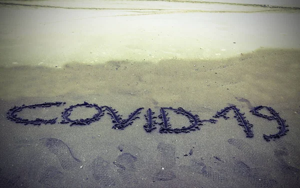 Text Covid Sand Beach Lockdown Old Toned Effect — Stock Photo, Image