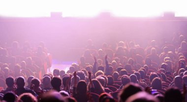 many people at live concert and lights of stage