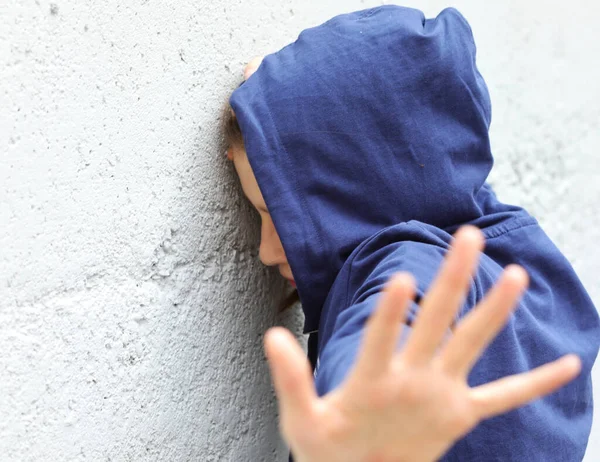 Girl Hoodie Trying Protect Herself Attacker Her Hand — Stock Photo, Image