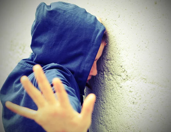 Girl Hoodie Trying Protect Herself Attacker Her Hand Old Toned — Stock Photo, Image