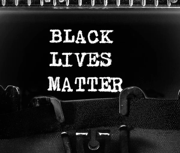 White text BLACK LIVES MATTER on black background the old typewriter