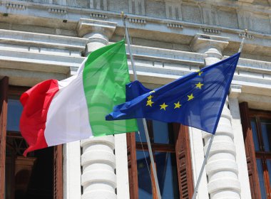 Italian Flag and European Flag during international meeting clipart