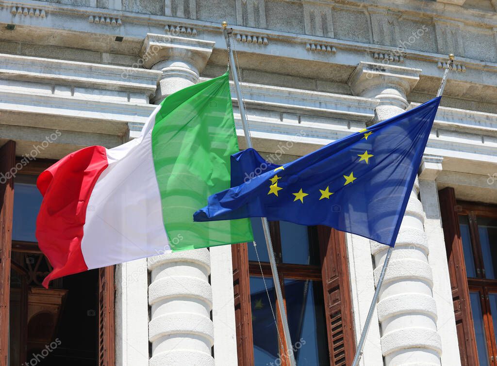 Italian Flag and European Flag during international meeting