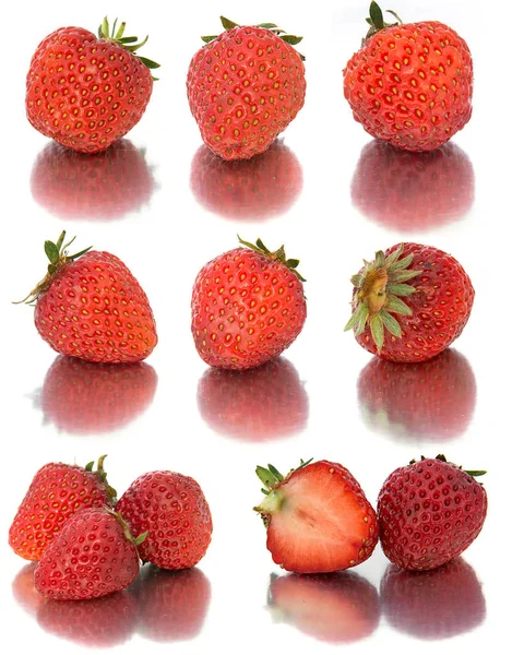 Viele verschiedene Erdbeersets auf weißem Hintergrund, isoliert mit Erdbeeren, viele verschiedene Erdbeeren auf einem Blatt. — Stockfoto