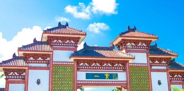 Buddhist Centre in the open air. in the Park of culture and religion. high gate into the Park and beautiful flowerbeds