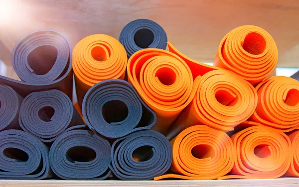 materials for yoga classes, mats, bricks and straps, bowl for meditation. everything you need for yoga.