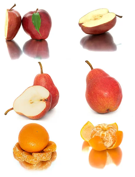 A lot of ripe and juicy fruit on a white background. Apples and pears and Mandarin together. — Stock Photo, Image